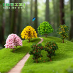 Miniature Landscape Fruit & Flower TreesHere is the professional product description for the Miniature Artificial Fruit & Flower Trees, following the exact format and style of your previous listings: ​Miniature Landscape Fruit & Flower Trees ​These vibrant miniature trees are designed to bring a splash of color and life to your creative projects. Whether you are building a lush orchard or a blooming garden, these realistic apple and flower trees add the perfect organic touch to any micro-landscape. ​🔧 Key Features ​🍎 Detailed Fruit & Foliage – Features realistic miniature apples and colorful blossoms for a lifelike appearance. ​🌳 Natural Aesthetic – Designed with a textured trunk and dense canopy to mimic real fruit trees. ​🧱 Perfect for Landscaping – Ideal for adding height and variety to dioramas, architectural models, and sand tables. ​💪 Durable & Flexible – Made from high-quality materials that are easy to position and long-lasting. ​✨ Versatile Decor – Great for moss micro-landscapes, terrariums, and dollhouse gardens. ​🎨 Applications ​Miniature orchards & garden dioramas 🍎 ​Moss micro-landscape & terrarium decoration 🌿 ​Architectural models & urban greening layouts 🧱 ​Fairy gardens & miniature hobbyist projects ✨ ​Educational school projects & creative displays 📚 ​📦 Product Specifications ​Type: Artificial Miniature Tree ​Style: Apple Tree / Flowering Landscape Tree ​Material: High-quality Plastic & Fiber ​Use: Diorama / Resin Art / Model Making ​Variety: Available in various fruit and flower styles ​🛠️ How to Use ​Placement: Position the tree on your base material (moss, foam, or sand). ​Fixing: Use a drop of glue at the base of the trunk for a permanent, sturdy hold. ​Layering: Group multiple trees together to create a realistic forest or orchard effect. ​⚠️ Tips ​Mix flower trees with fruit trees to create a diverse and colorful seasonal look. ​Best used alongside moss and small stones to ground the tree in a natural setting. ​Perfect for adding a "pop" of color to green-heavy resin art scenes. ​🛒 Why Choose Epoxy Craft BD? ​✅ Premium Nature Materials – High-detail trees that look beautiful in any light. ✅ Creative Freedom – Huge variety of styles to match your specific project vision. ✅ Affordable Crafting – Get professional-grade landscaping materials at the best price. ✅ Trusted Supplier – Proudly supporting the creative community in Bangladesh. - Image 2